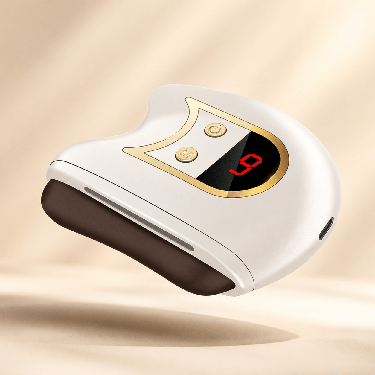 White Gua Sha electronic device with digital display on a beige background