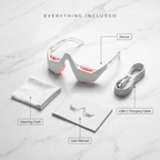 The Halo with cleaning cloth, USB-C charging cable, and user manual on a marble surface