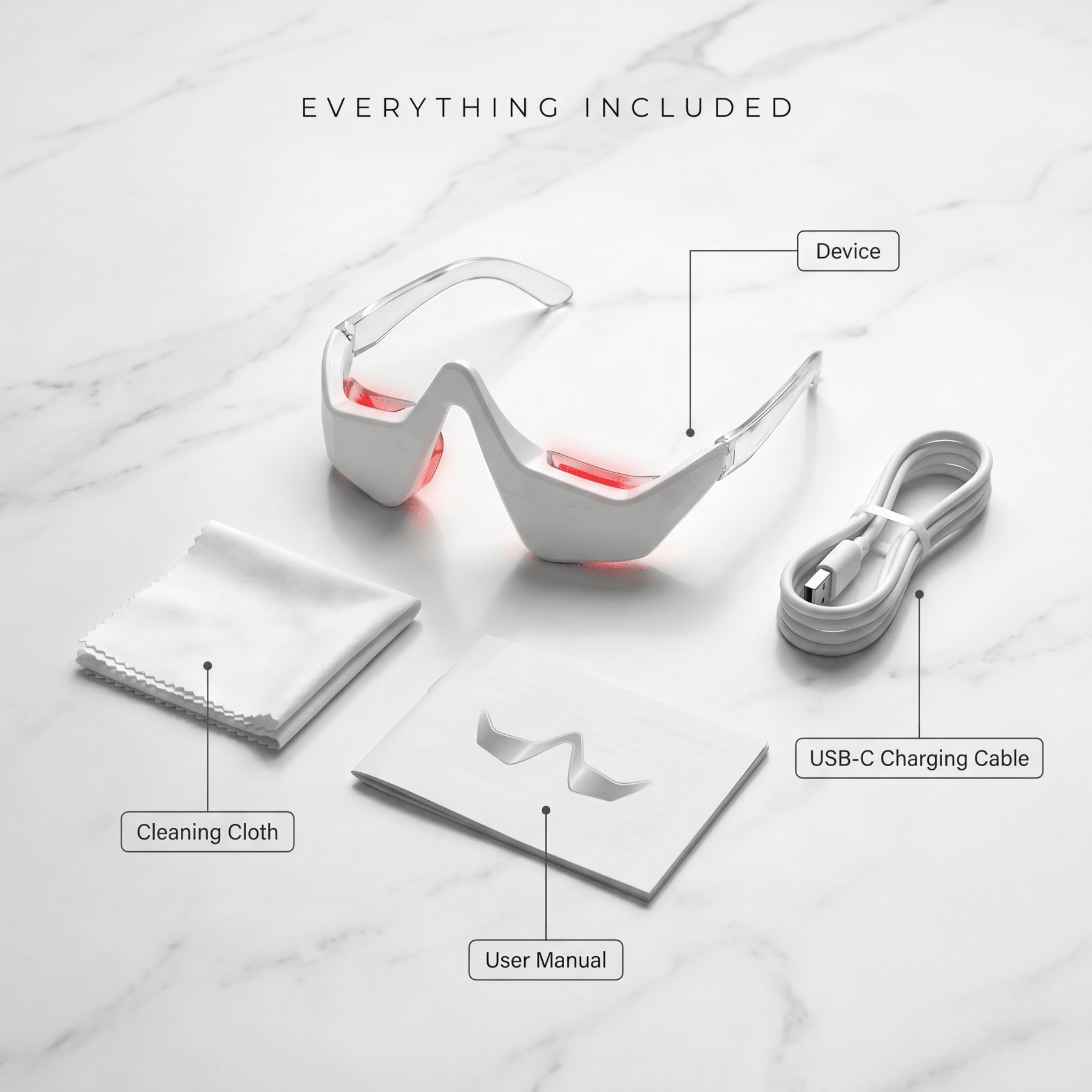 The Halo with cleaning cloth, USB-C charging cable, and user manual on a marble surface