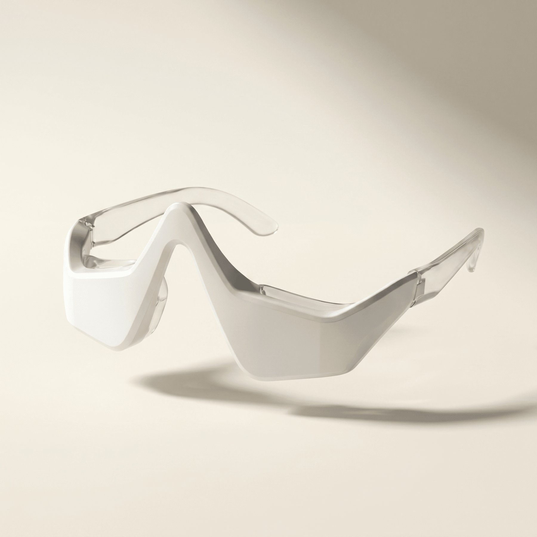 Wearable red light therapy glasses on a beige background